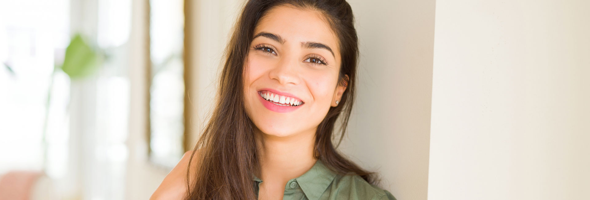 Beautiful woman smiling after cosmetic dentistry