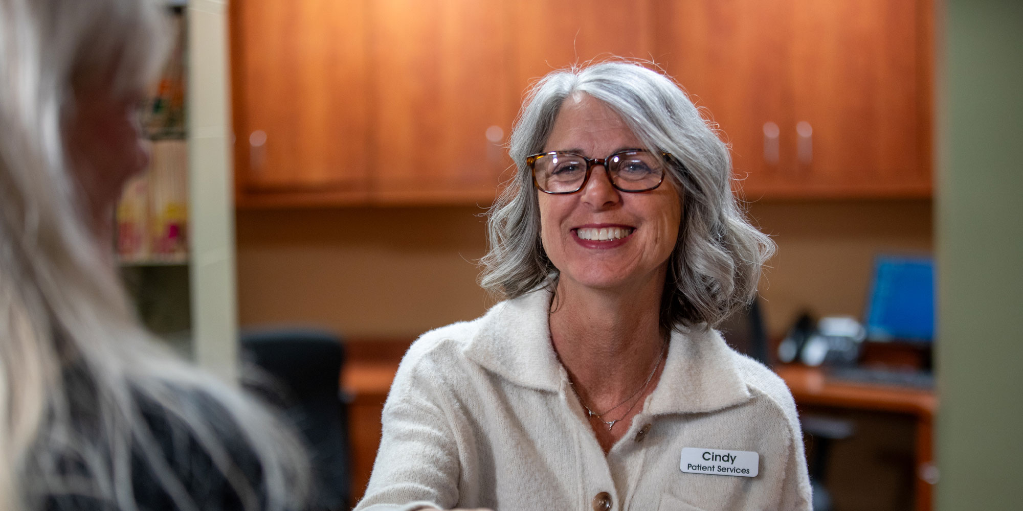Patient shaking team members hand